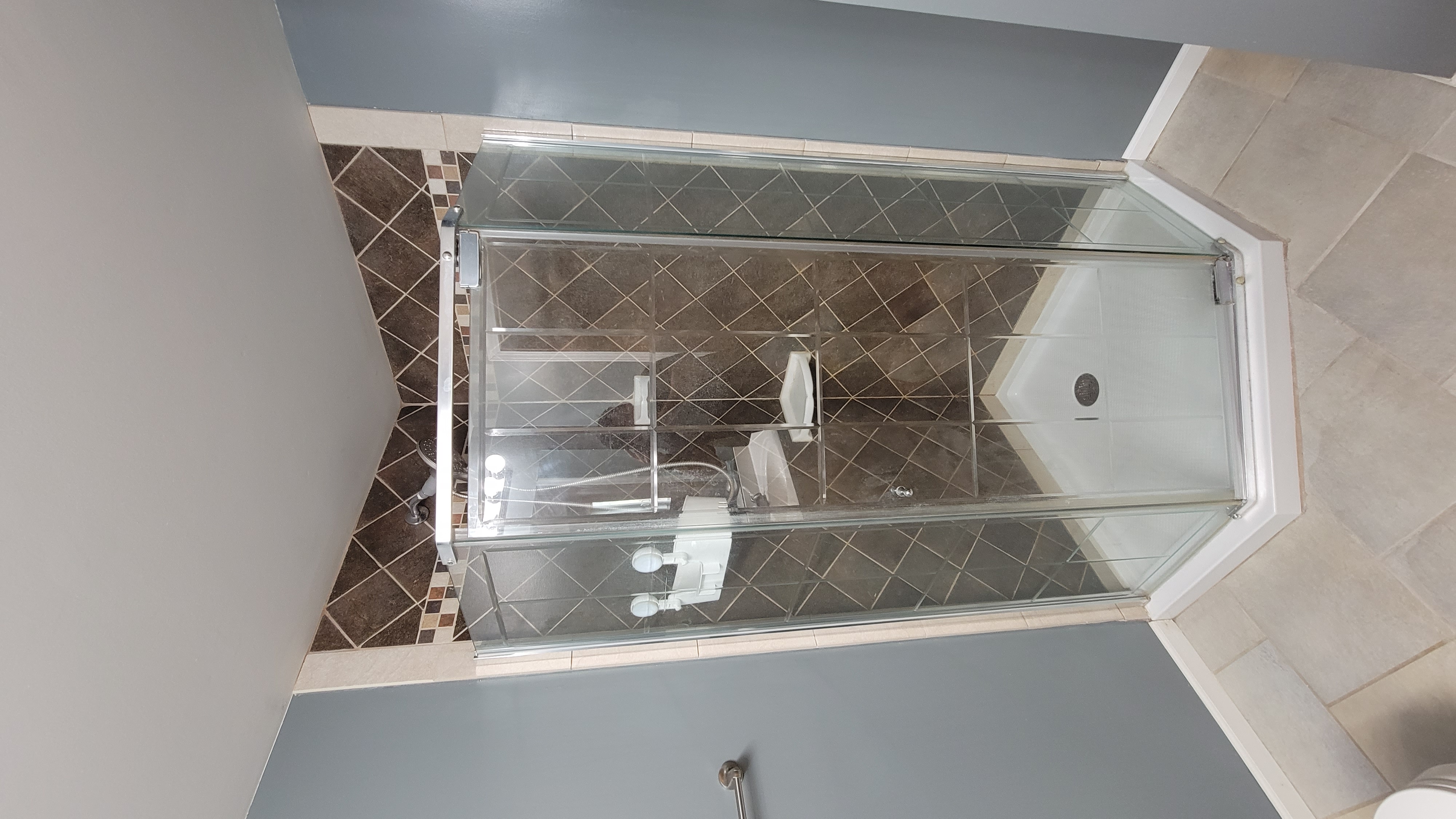 Lower bath tiled shower